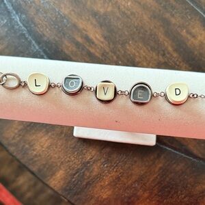 Chic Brass and Black 'Loved' Charm Bracelet